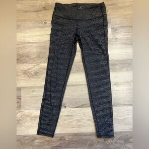 Athleta black (w/ white sm zig zags) women’s leggings, wide waistband, Med